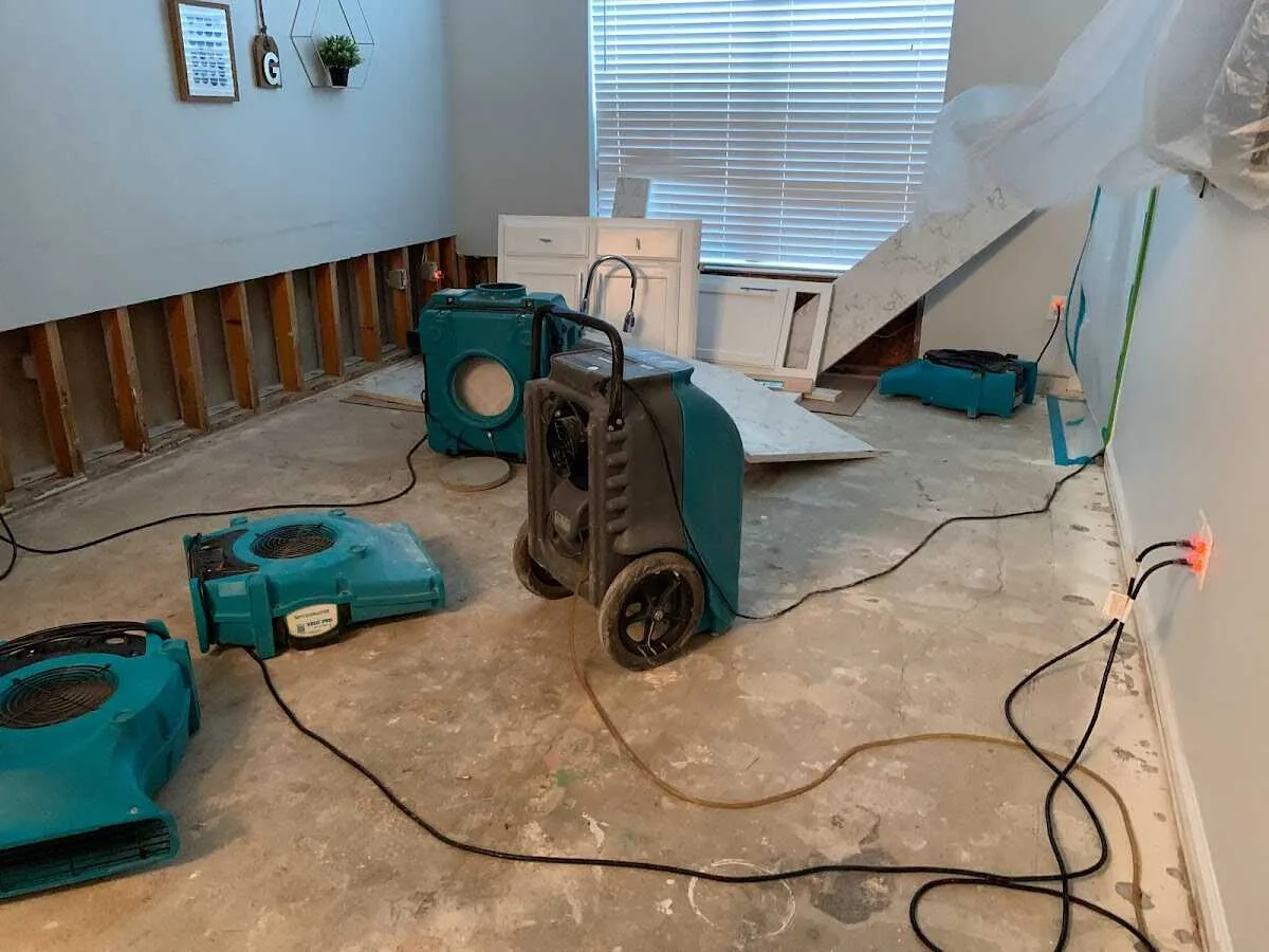 Dehumidifier in flood-cut room for Water Damage Restoration in Holly Hill